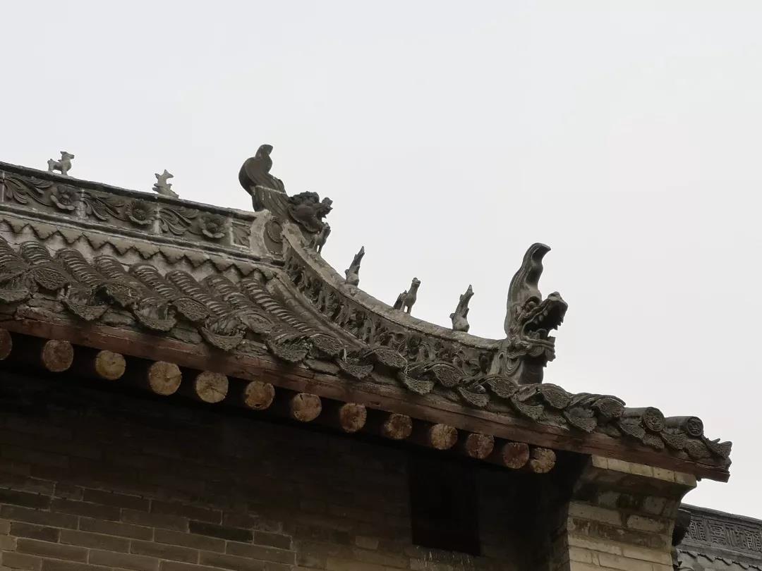 屹立百年的守护者——屋脊上的神兽